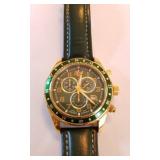 U - DANIEL STEIGER GOLD-TONE WATCH (J89)