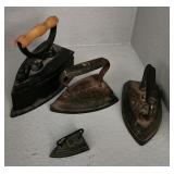 F - LOT OF FOUR ANTIQUE IRONS (K13)