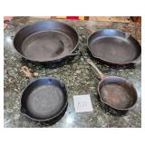 V - FOUR PIECES CAST IRON COOKWARE (K26)