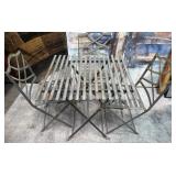 11 - PATIO TABLE WITH THREE CHAIRS