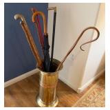 15 - BRASS-TONE UMBRELLA STAND WITH CONTENTS