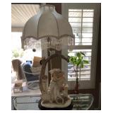 431 - TABLE LAMP WITH FIGURAL VASE & FRINGED SHADE