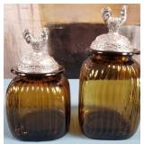 444 - TWO AMBER GLASS CANISTER JARS (E5)