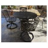 15 - WROUGHT IRON PATIO TABLE WITH FOUR CHAIRS