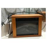 F - HEAT SURGE FIREPLACE HEATER (M71)