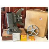 F - VINTAGE DeJUR MODEL 750 8MM MOVIE PROJECTOR