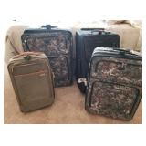 F - FOUR PIECES OF LUGGAGE (Z10)