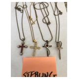 313 - FOUR STERLING SILVER CROSS NECKLACES (A25)