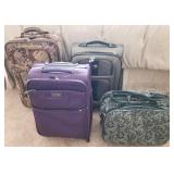 F - FOUR PIECES OF LUGGAGE (Z9)