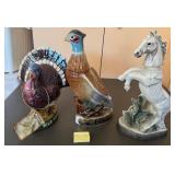 Z - THREE COLLECTIBLE CERAMIC DECANTERS (G107)