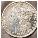 1885 - MORGAN SILVER DOLLAR (566 A)