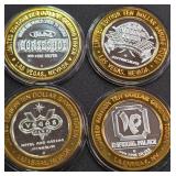 LOT OF 4 - $10  SILVER DOLLAR GAMING TOKEN (551 H)