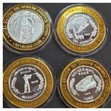 LOT OF 4 - $10  SILVER DOLLAR GAMING TOKEN (551 F)