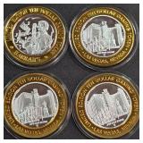 LOT OF 4 - $10  SILVER DOLLAR GAMING TOKEN (551 Q)