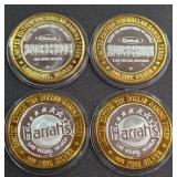 LOT OF 4 - $10  SILVER DOLLAR GAMING TOKEN (551 P)
