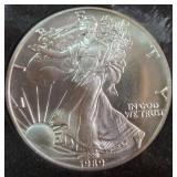 1989 - 1oz FINE SILVER ONE DOLLAR (579 D)
