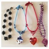 Z - FOUR COSTUME JEWELRY NECKLACES (J137)