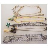 Z - SIX COSTUME JEWELRY NECKLACES (J63)