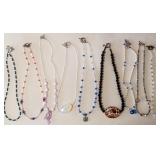 Z - NINE COSTUME JEWELRY NECKLACES (J55)