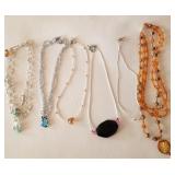 Z - SIX COSTUME JEWELRY NECKLACES (J138)