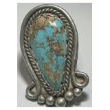 A LARGE STERLING SILVER TURQOUISE RING 22.10GRS