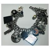A MASSIVE STERLING SILVER 7 INCH CHARM BRAC.68GRS