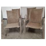 11 - FOUR PATIO STACKING CHAIRS (H46)