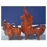 489 - TWO CARVED WOOD BULL FIGURINES (N25)