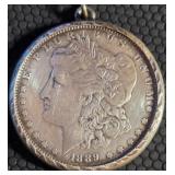 KEY TO RENO - 1889 MORGAN SILVER DOLLAR (656 AC)