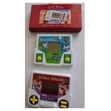 S2 - THREE HAND-HELD VIDEO GAMES (M120)