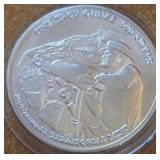 ONE TROY OUNCE .999 FINE SILVER COIN (12)