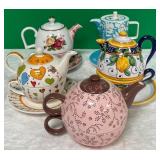 11 - FIVE COLLECTIBLE TEAPOTS (D20)