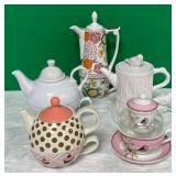 11 - FIVE COLLECTIBLE TEAPOTS (D10)