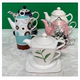 11 - FIVE COLLECTIBLE TEAPOTS (D8)