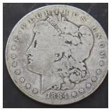 S - 1884 MORGAN SILVER DOLLAR