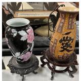 11 - TWO DECORATIVE VASES WITH STANDS