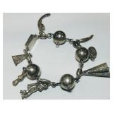 STERLING SILVER CHARM BRACELET37.4 GRS