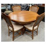 11 - ROUND TABLE WITH FOUR CHAIRS