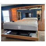 16 - ADJUSTABLE BED WITH HEADBOARD WALL UNIT