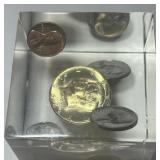 COINS IN LUCITE