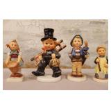 11 - FOUR HUMMEL FIGURINES (M98)