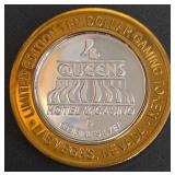 4 QUEENS CASINO - $10 .999 SILVER TOKEN (84)