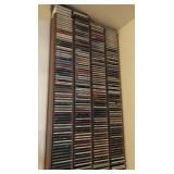 S1 - LOT OF CDS WITH STORAGE RACK (A70)