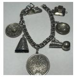 STERLING SILVER  MEXICAN CHARM BRACELET 32.4 GRS
