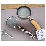 503 - LOT OF THREE MAGNIFYING GLASSES