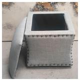 11 - UPHOLSTERED STORAGE FOOTSTOOL
