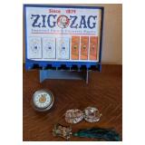 M - ZIG-AG DISPENSER, COIN PURSES, TASSEL (N123)