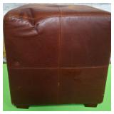 11 - BROWN LEATHER LIKE OTTOMAN 16X16 (P149)