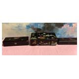 11 - THREE BLACK LACQUERWARE KEEPSAKE BOXES