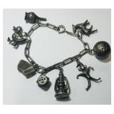 STERLING SILVER 7 ICH CHARM BRACELET 22.00GRS